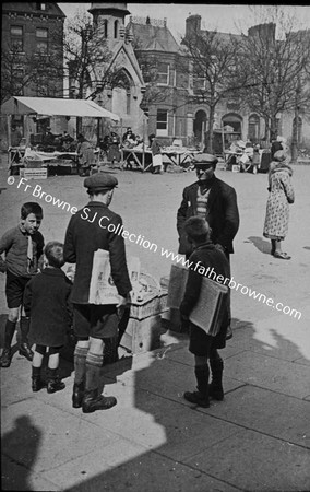 STREET SCENE WITH NEWSBOYS